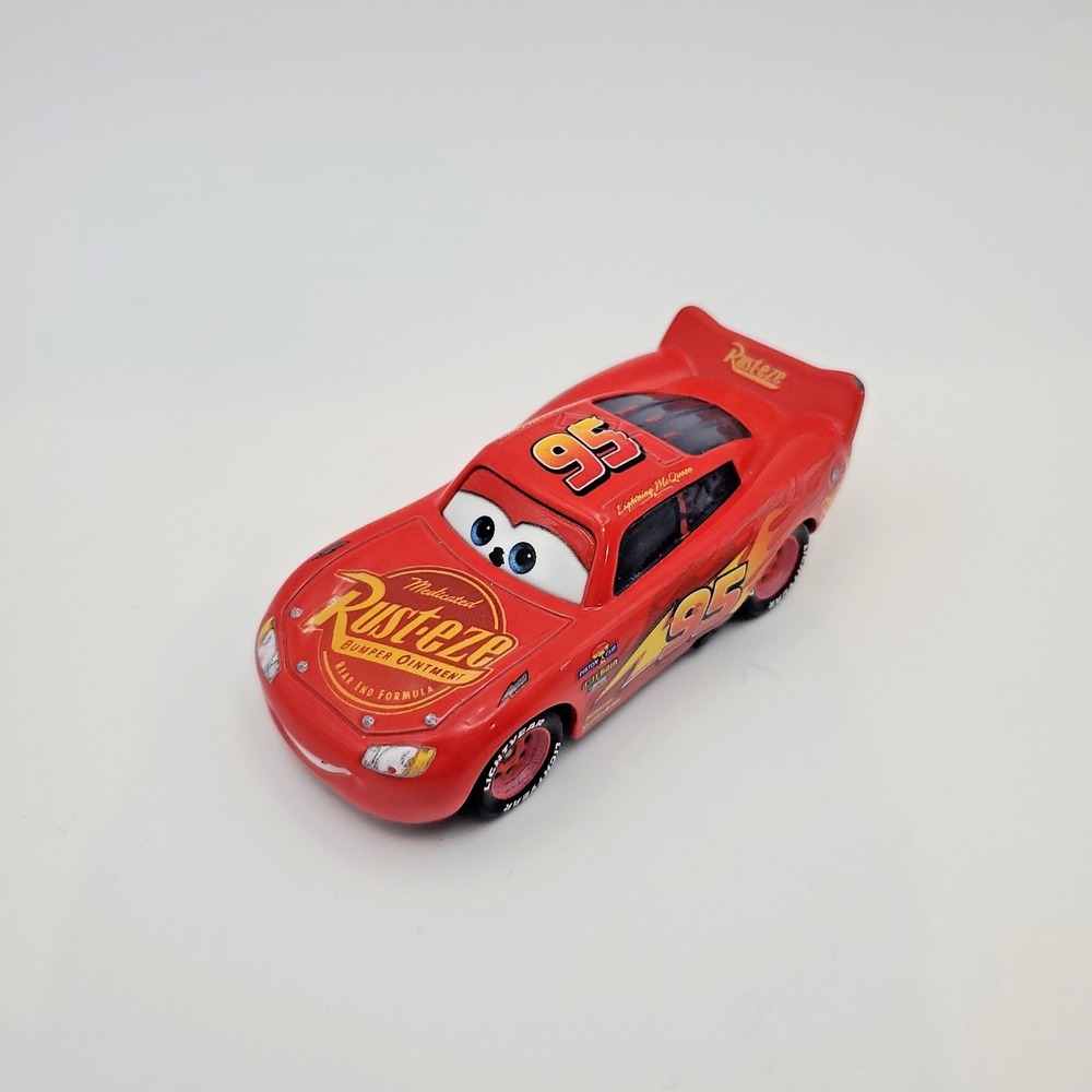 Disney Pixar Cars RUST-EZE LIGHTNING MCQUEEN RED 1:55 Die Cast Toy Closed Smile